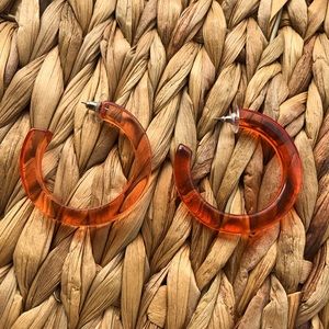 Chubby orange hoop earrings